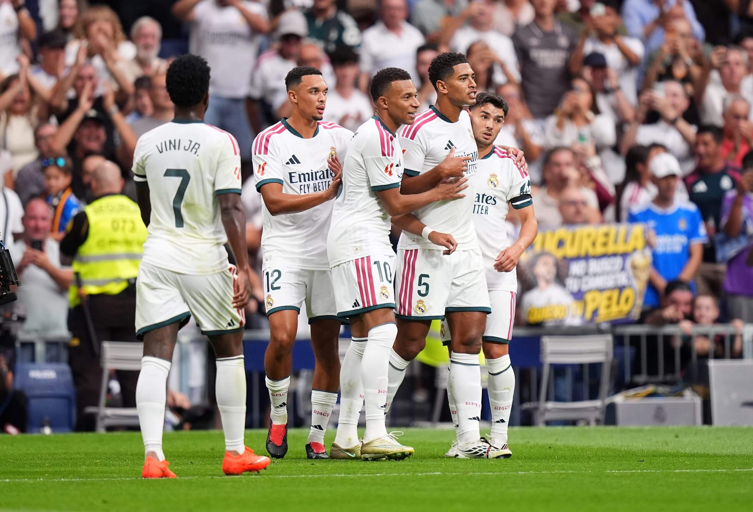 Jude Bellingham is congratulated by his Real Madrid team-mates