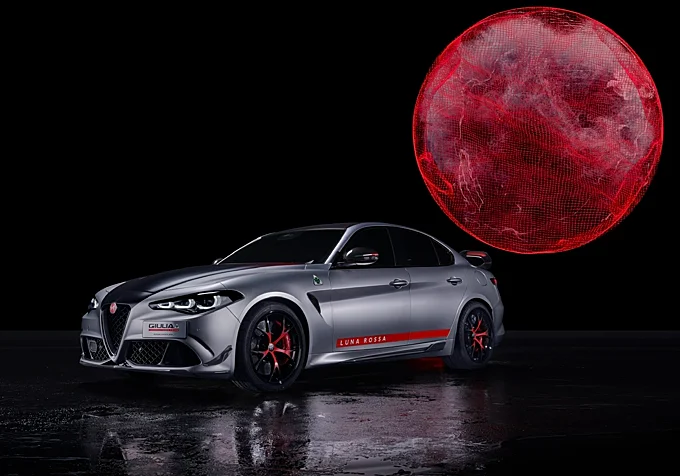 Design where every line serves a purpose: this model shuns decorative trim, answering strict aerodynamic demands while highlighting red team accents and a carbon‑fiber‑rich structure in wings and foils