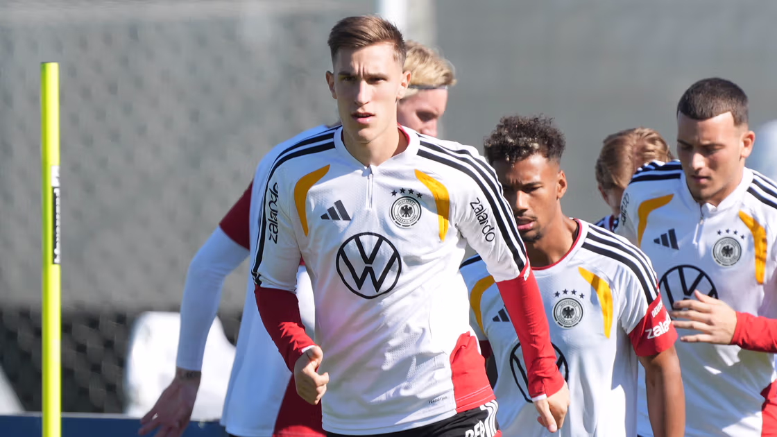 Nico Schlotterbeck sidelined with ankle injury, missing Germany squad.