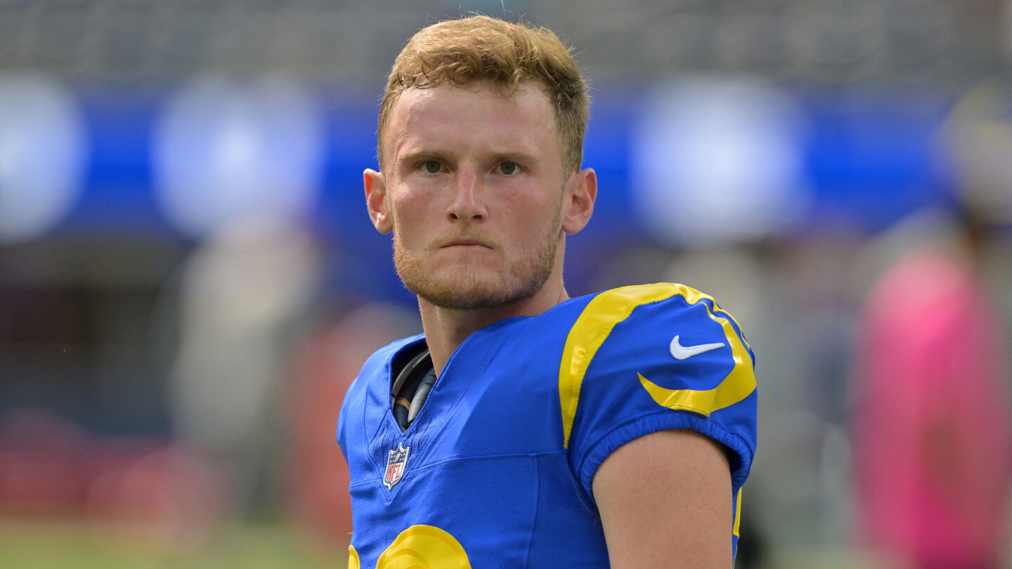Rams kicker Blake Grupe leaving SoFi Stadium on crutches with a leg brace