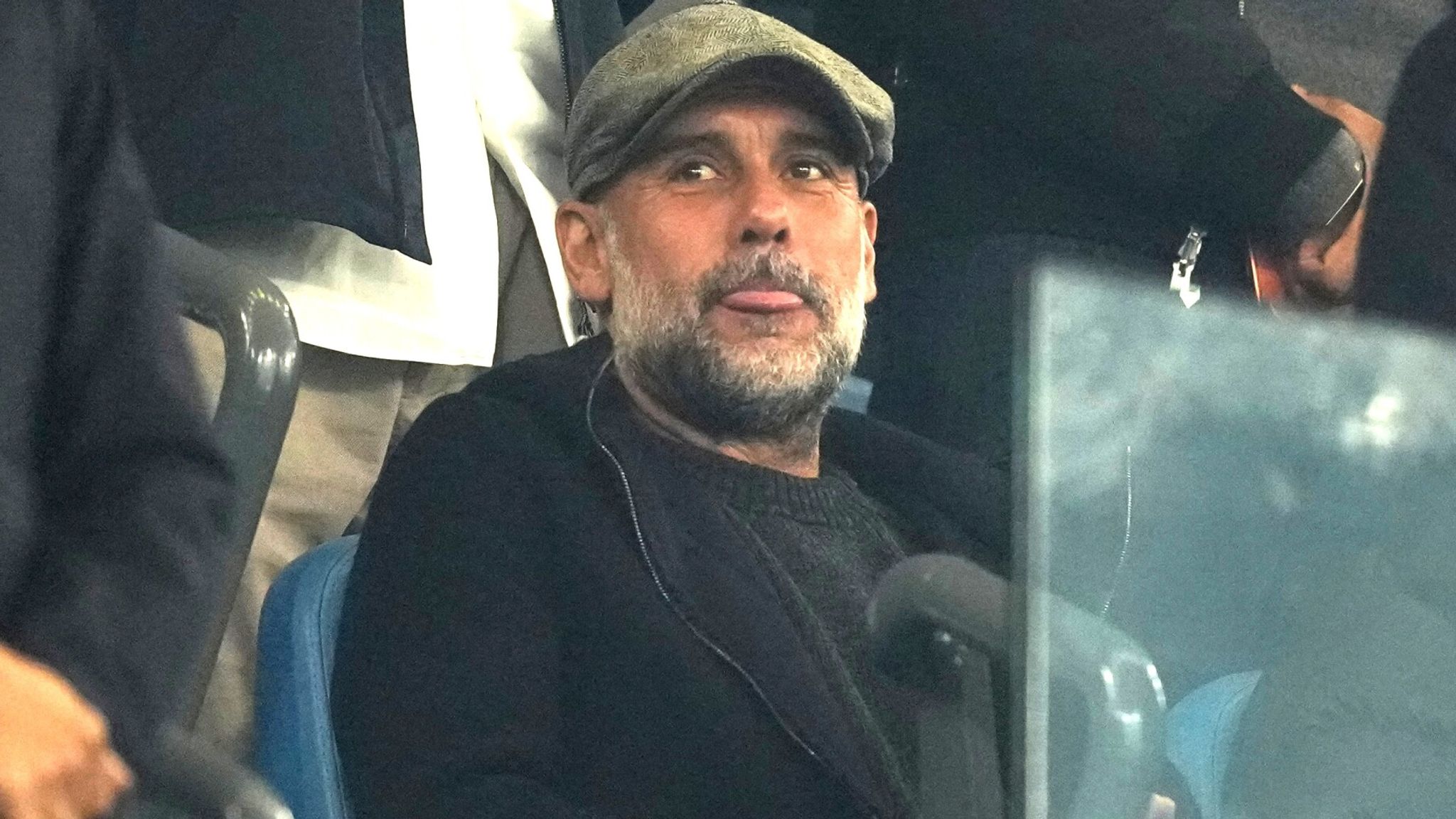 Former Manchester City manager Pep Guardiola seated in the stands for the first time since his departure